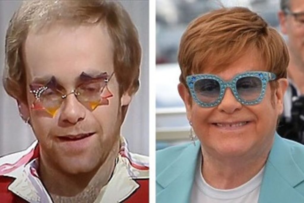 Elton John wearing a custom wig on stage